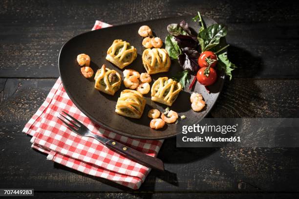 puff pastry filled with salmon and shrimps - puff pastry stock pictures, royalty-free photos & images