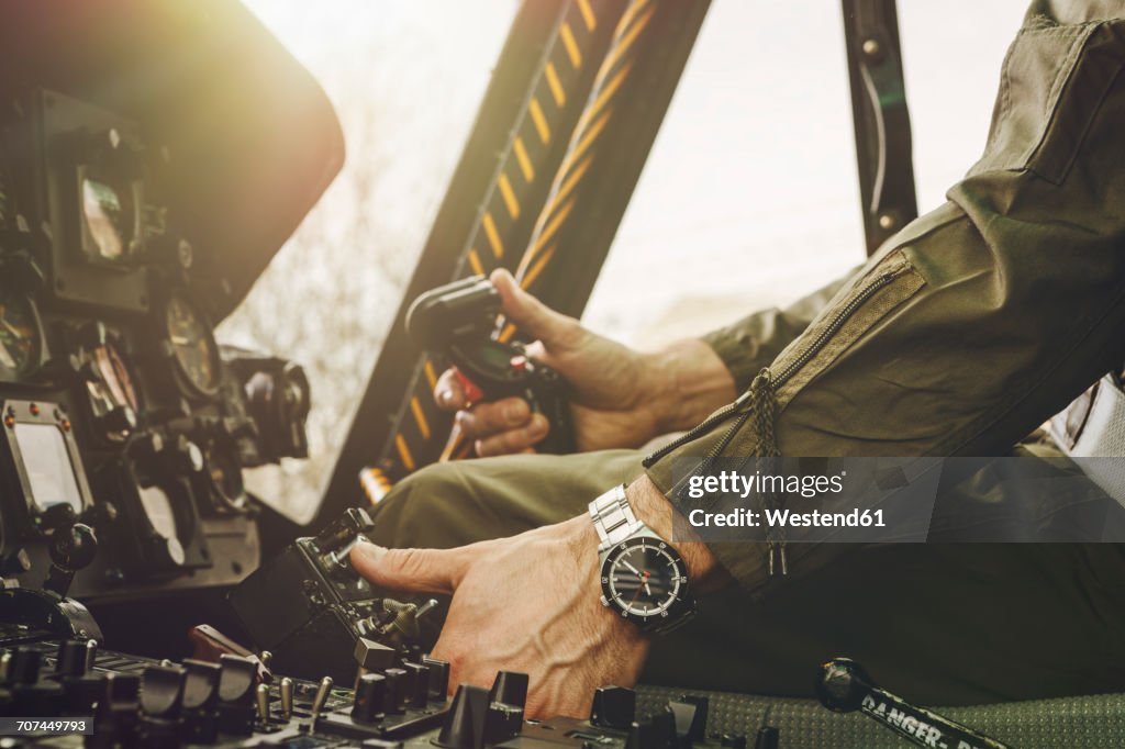 Close-up of pilot in cockpit of a helicopter