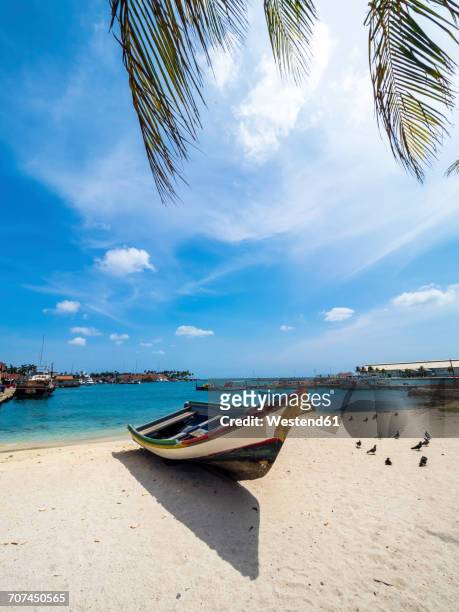 aruba, oranjestad, boat on the beach - aruba bildbanksfoton och bilder