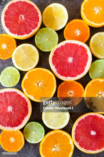 sliced citrus fruits - lime overhead stock pictures, royalty-free photos & images