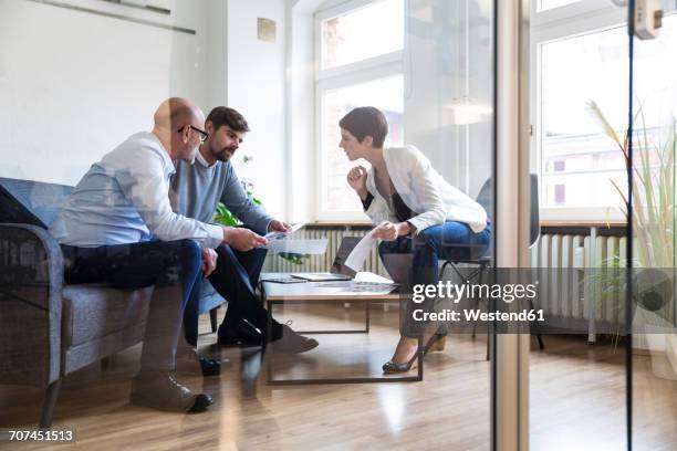 colleagues working together in boardroom - people in meeting room stock pictures, royalty-free photos & images