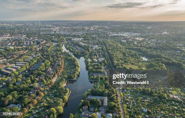 germany, hamburg, aerial view of district alsterdorf with eppendorfer moor nature reserve - city photos stock-fotos und bilder