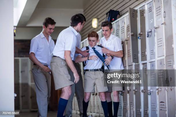 high school students bullying classmate - aggression school stock pictures, royalty-free photos & images