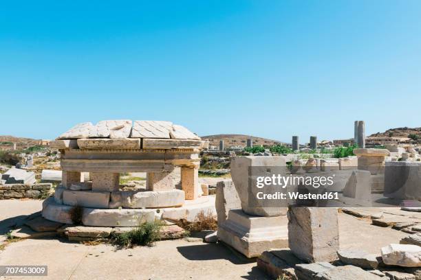 greece, mykonos, delos, archaeological site - ancient greece photos stock-fotos und bilder