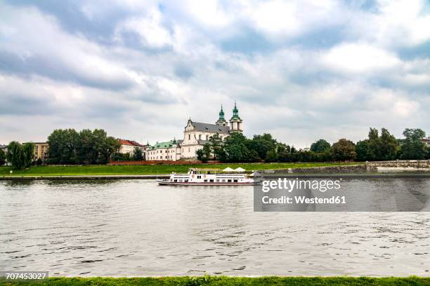 poland, krakow, pauline monastery and st. michael's church at vistula river - passenger craft bildbanksfoton och bilder