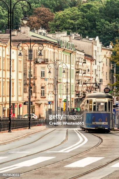 poland, krakow, tram in the old town - krakow poland stock pictures, royalty-free photos & images