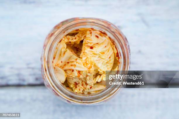 glass of kimchi - kimchee stock-fotos und bilder