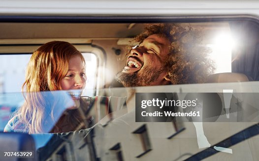 Happy young couple in a car Happy young couple in a car