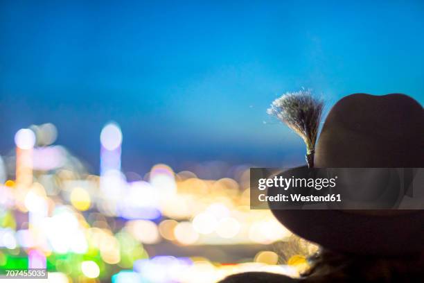 germany, munich, back view of man wearing hat with gamsbart at beer fest - tourism life in bavaria foto e immagini stock