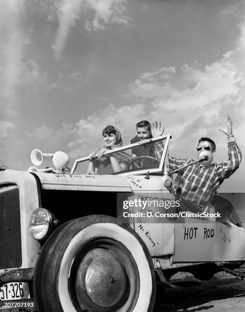 1950s TEENS IN ROOFLESS HOTROD WITH GRAFFITI ATOM & EVE NO KISSING ETC.