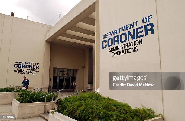 Man exits the Los Angeles County Coroners office April 16, 2002 in Los Angeles, CA. Some coroner employees, represented by Service Employee Union...
