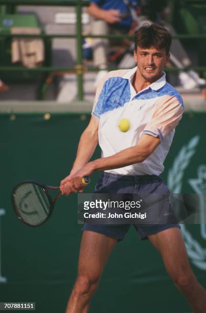 Goran Ivanisevic of Croatia returns against Boris Becker in the Men's Singles Final of the Mannai Cadillac Qatar Tennis Open on 11 January 1993 at...