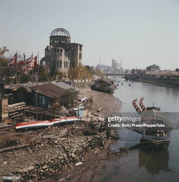 View of the Hiroshima Peace Memorial with the Atomic Bomb Dome seen from the bank of the Ota River beside the Hiroshima Peace Memorial Park in Japan...