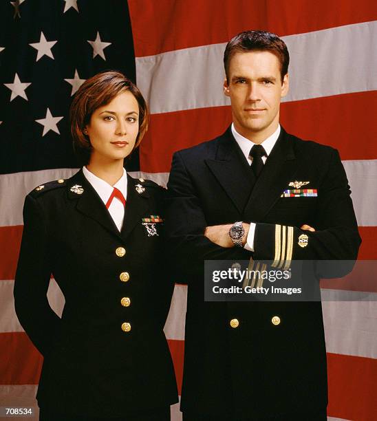 Actors David James Elliott and Catherine Bell star in "JAG."