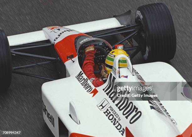 Ayrton Senna of Brazil drives the Honda Marlboro McLaren McLaren MP4/4 Honda RA168E turbo during the Grand Prix of Monaco on 15 May 1988 on the...