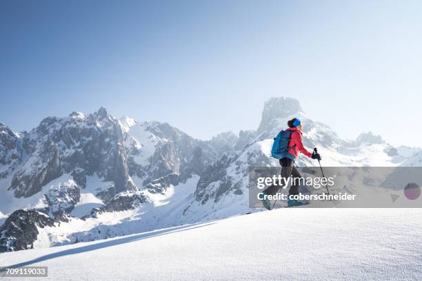 woman cross-country skiing, salzburg, austria - langlaufen stock-fotos und bilder
