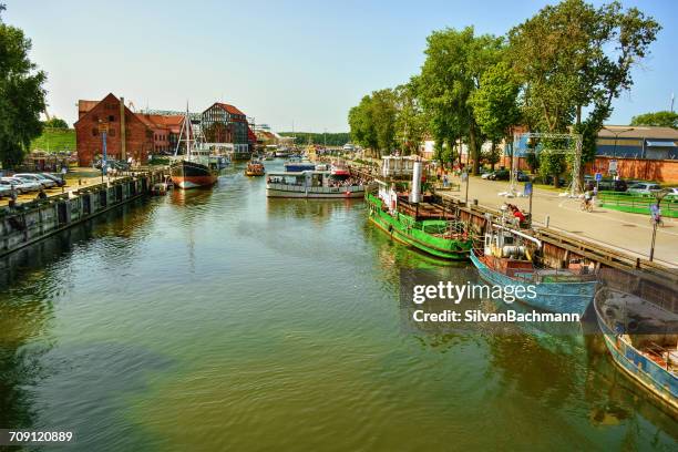 boats on neman river, klaipeda, lithuania - lithuania woman stock pictures, royalty-free photos & images