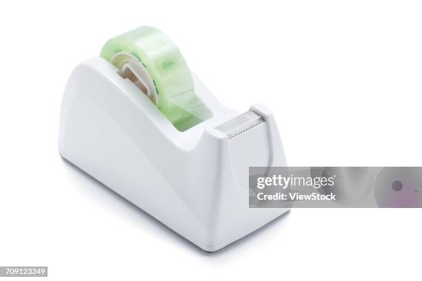 tape dispenser - tape dispenser photos et images de collection