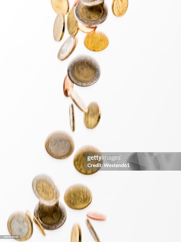 Falling Euro coins