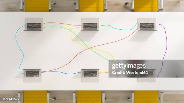 conference table with connected laptops, 3d rendering - conference table top view stock illustrations