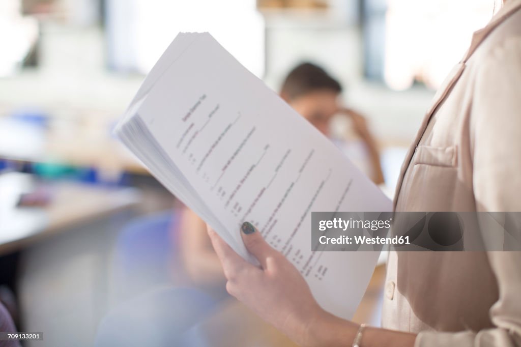 Tested Notes High School Teacher With Test Notes In Classroom High-Res Stock Photo ...