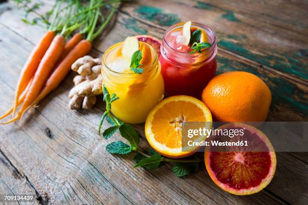 Juice With Oranges And Ginger And Mint And Carrots, Foto stock