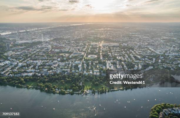 germany, hamburg, aerial view of outer alster lake in the evening - alster river stock pictures, royalty-free photos & images