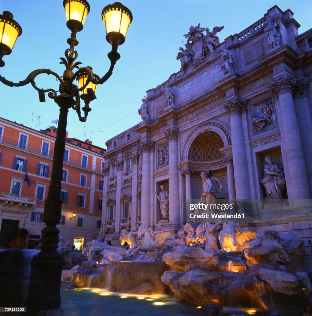 Italy, Rome, lighted Trevi Fountain in the evening