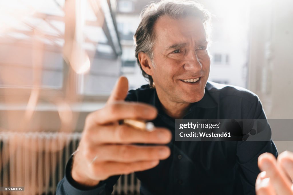 Portrait of smiling mature businessman