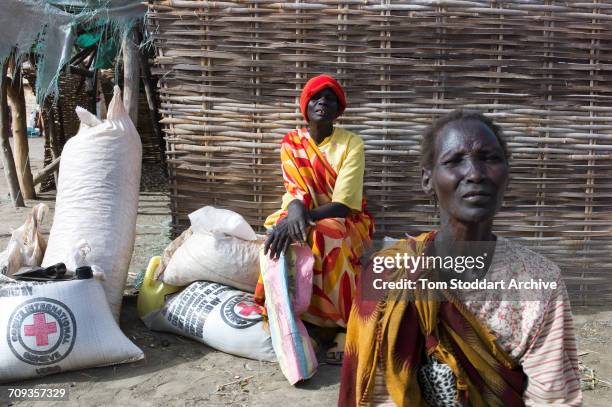 Scene during an International Committee of the Red Cross distribution of seeds, agricultural tools and food staples to households in villages around...