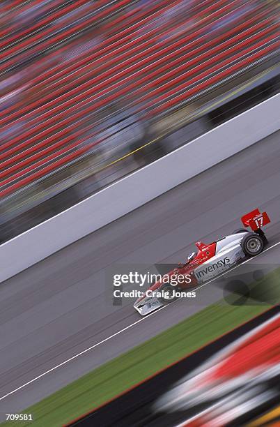 Scott Dixon of New Zealand of PacWest Lights races during the Detroit News 100, part of the Indy Racing Northern Lights Series at the Michigan...
