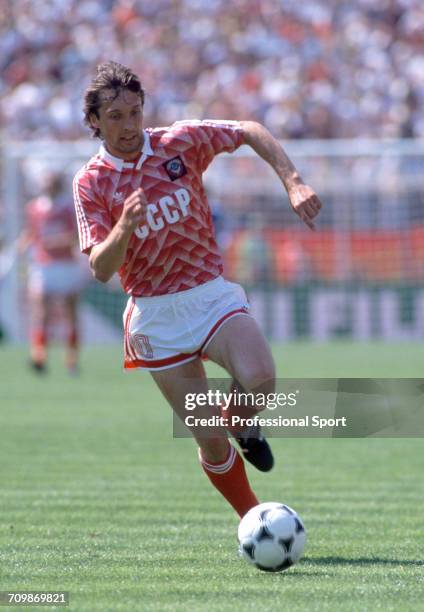 Ukranian footballer Oleh Protasov makes a run with the ball during play for the Soviet Union team in the UEFA Euro 1988 European football...