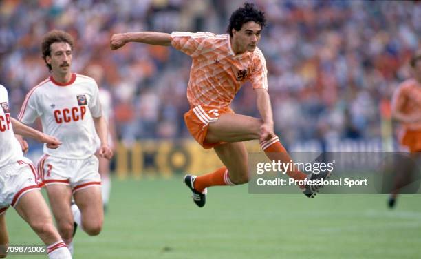 Dutch footballer Gerald Vanenburg shoots for goal in an attack for Netherlands against the Soviet Union in the final of the UEFA Euro 1988 European...