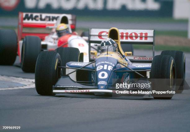 Damon Hill of Great Britain, driving a Williams FW15C with a Renault RS5 3.5 V10 engine for Canon Williams Renault, enroute to placing second during...