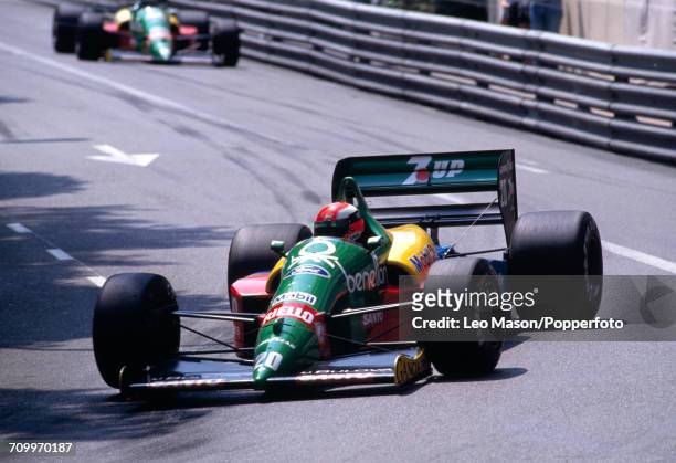 Johnny Herbert of Great Britain enroute to placing 14th, driving a Benetton B188 with a Ford V8 engine for the Benetton Formula Team, during the...