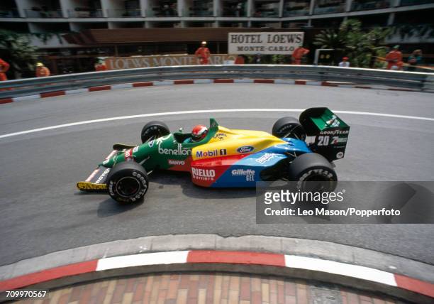 Johnny Herbert of Great Britain enroute to placing 14th, driving a Benetton B188 with a Ford V8 engine for the Benetton Formula Team, during the...