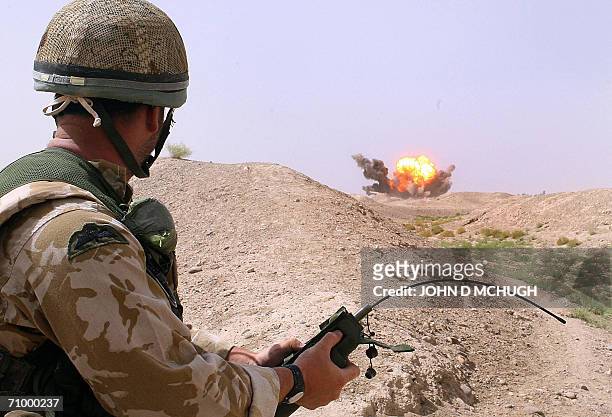 Lashkar Gah, AFGHANISTAN: British soldiers from the Bomb Squad, Helmand Task Force, load, move and destroy unexploded ordnance at the Provincial...