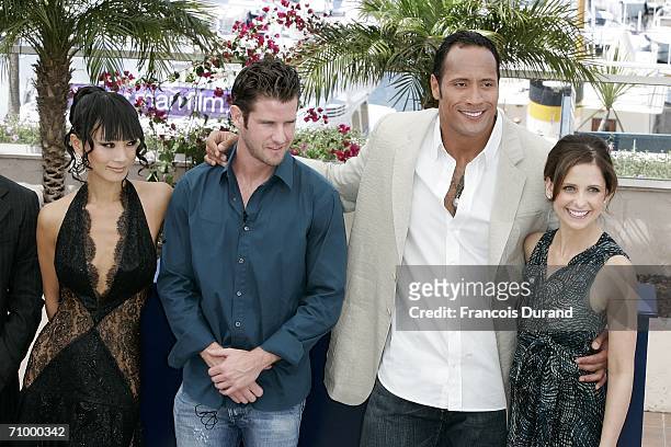 Actress Bai Ling, director Richard Kelly and actors Dwayne 'The Rock' Johnson and Sarah Michelle Gellar attend a photocall promoting the film...