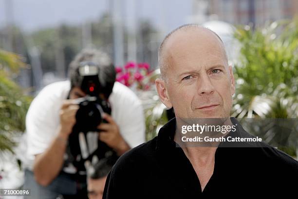 Actor Bruce Willis attends a photocall promoting the film 'Over The Hedge' at the Palais during the 59th International Cannes Film Festival on May...