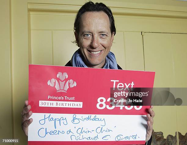 Richard E. Grant holds a birthday message as he promotes the Prince's Trust at Claridges on March 27, 2006 for the Prince's Trust 30th Birthday...