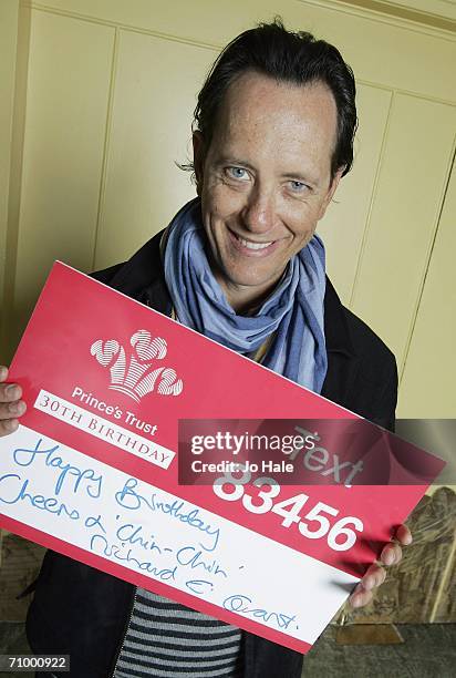 Richard E. Grant holds a birthday message as he promotes the Prince's Trust at Claridges on March 27, 2006 for the Prince's Trust 30th Birthday...