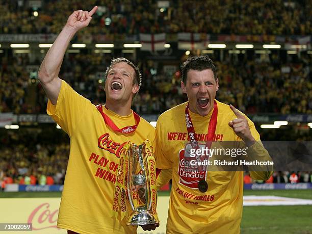 Watford Goalscorers Jay Demerit and Darius Henderson celebrate with the trophy following their Team's victory during the Coca-Cola Championship...