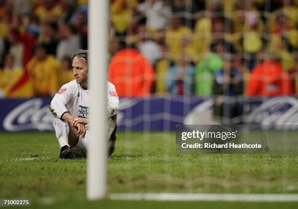 Dejected Shaun Derry of Leeds sits on the pitch after conceding a penalty during the Coca-Cola Championship Playoff Final between Leeds United and...