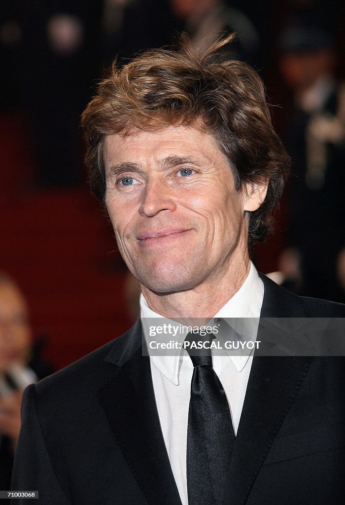 US actor Willem Dafoe poses upon arrivin