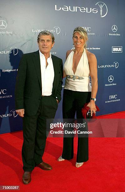 Academy member Giacomo Agostini and guest arrive at the Laureus Welcome Party in the Museu Nacional d'Art de Catalunya prior to the Laureus Sports...