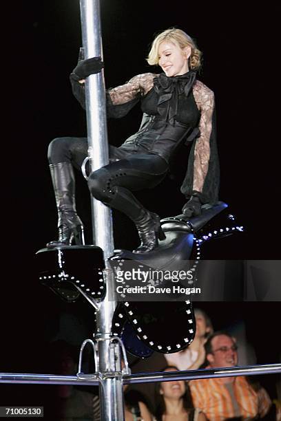 Pop icon Madonna performs on stage on the first night of her 'Confessions' World Tour at The Forum on May 21, 2006 in Los Angeles, California. The...
