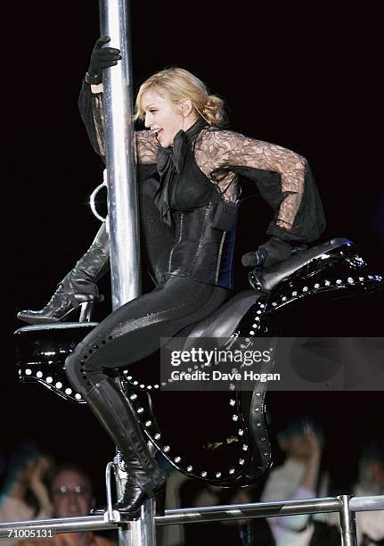 Pop icon Madonna performs on stage on the first night of her 'Confessions' World Tour at The Forum on May 21, 2006 in Los Angeles, California. The...