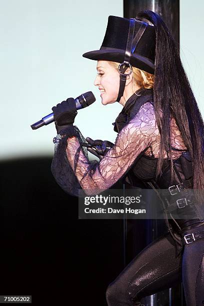 Pop icon Madonna performs on stage on the first night of her 'Confessions' World Tour at The Forum on May 21, 2006 in Los Angeles, California. The...
