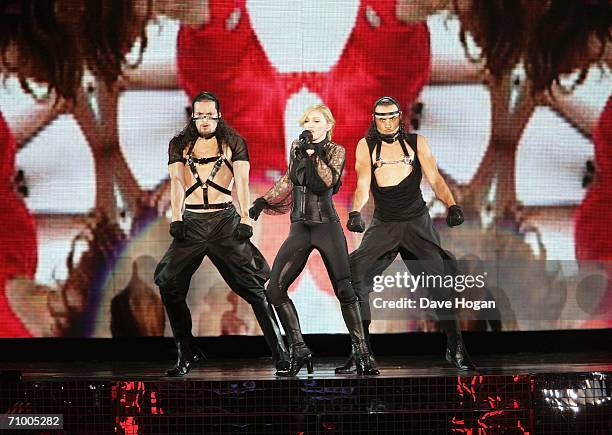 Pop icon Madonna performs on stage on the first night of her 'Confessions' World Tour at The Forum on May 21, 2006 in Los Angeles, California. The...