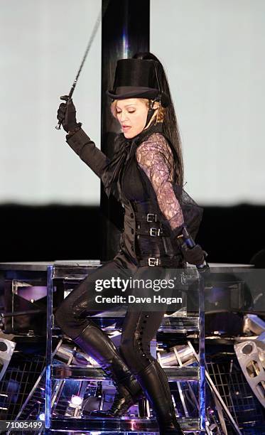 Pop icon Madonna performs on stage on the first night of her 'Confessions' World Tour at The Forum on May 21, 2006 in Los Angeles, California. The...